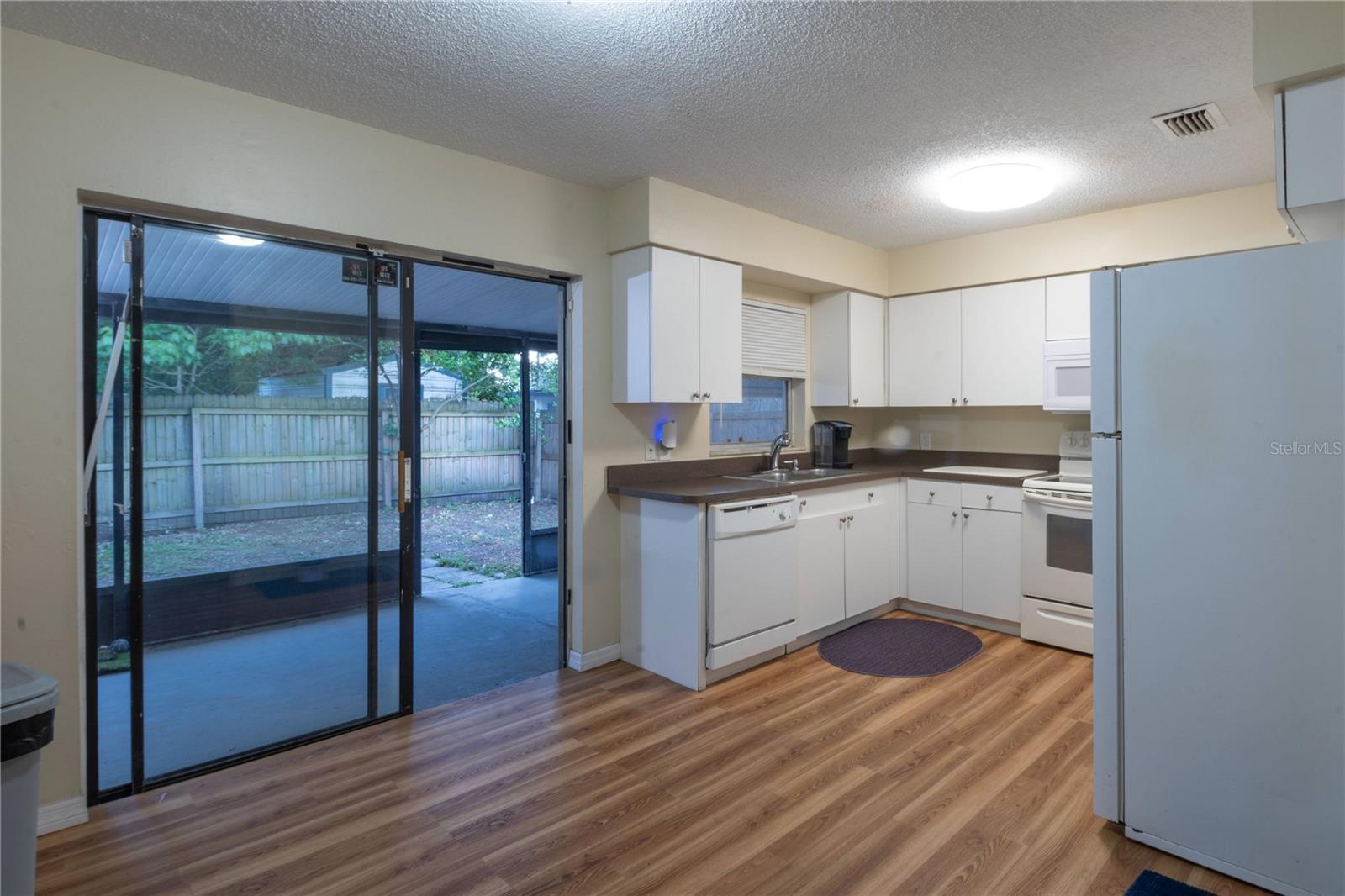 Kitchen with View of Patio/Backyard