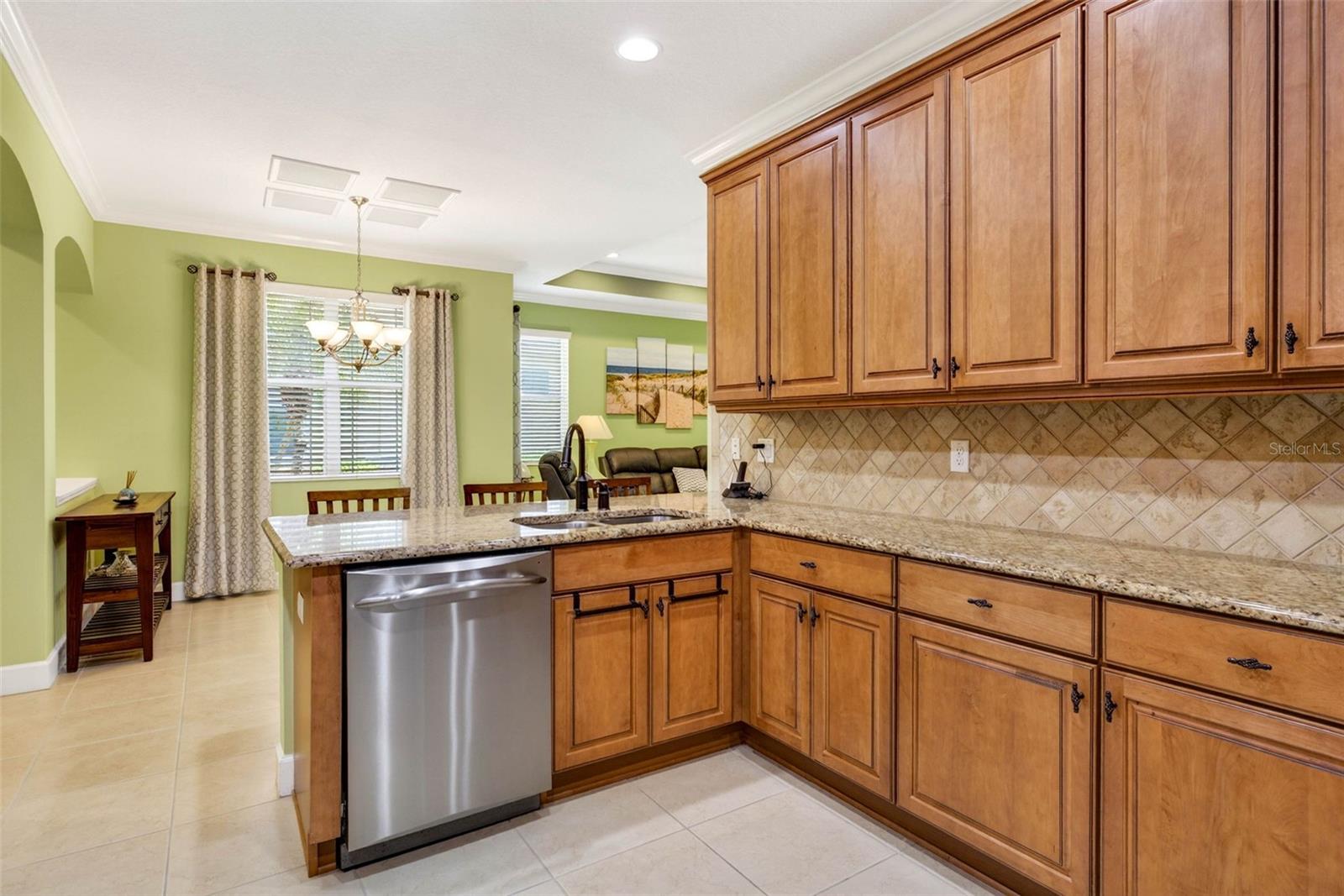Kitchen overlooks dining and living area.