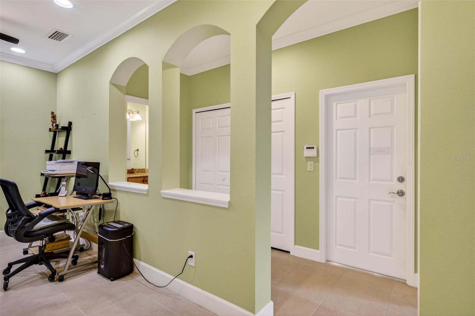 Office/den area. Laundry located in hallway closet. Washer/dryer convey