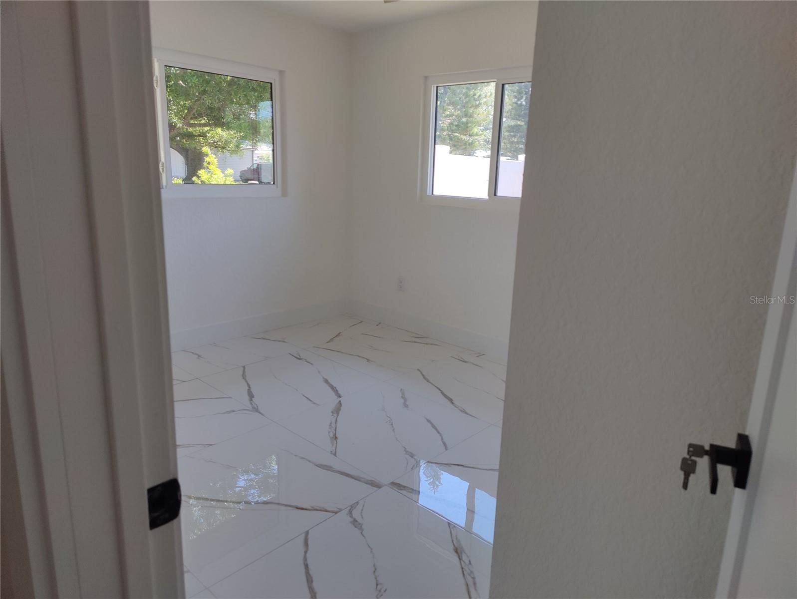 Hallway View Into Bedroom