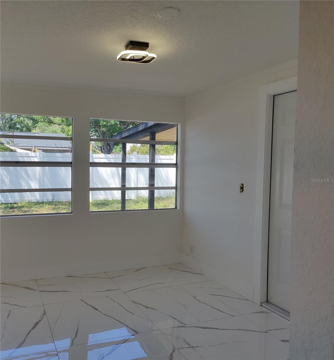 Office View from Kitchen Showing W/Door Carport