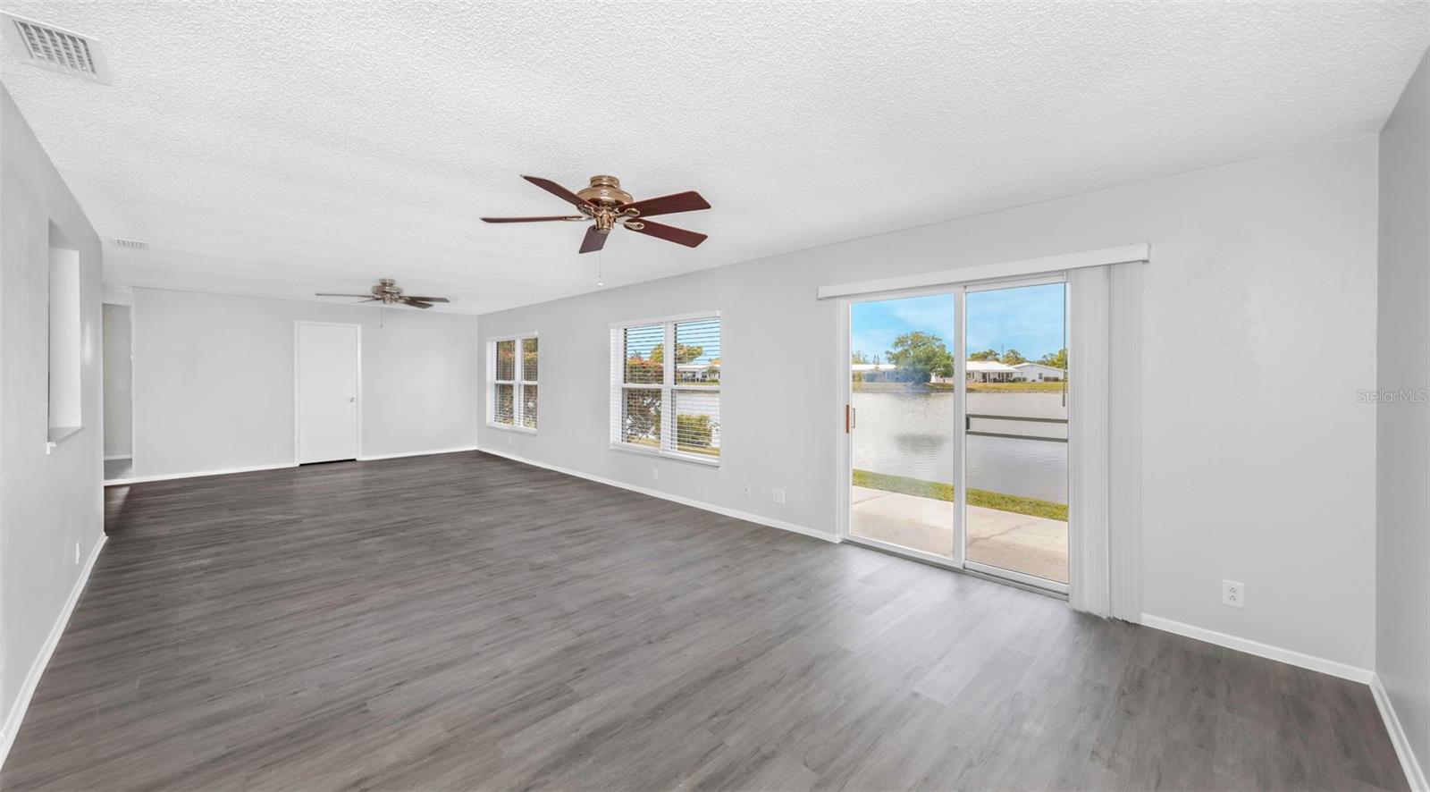 2 Windows and a Patio Door offer one-of-a-kind Lake Views!