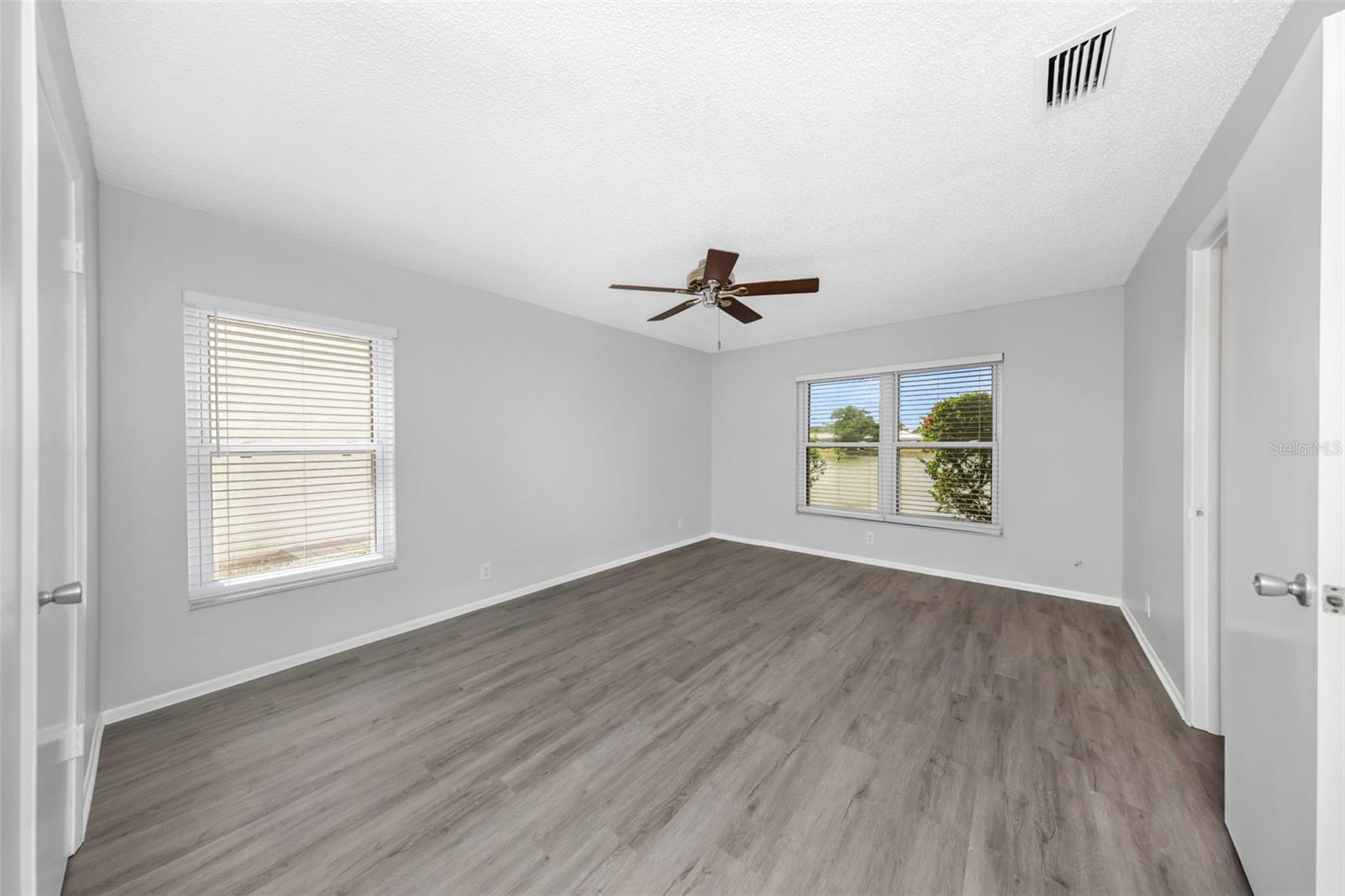 Primary Bedroom with view of Lake