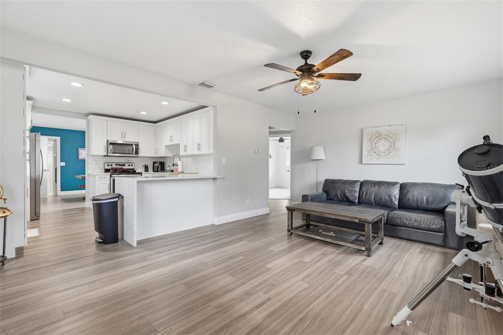 Bright open-concept living room with natural light