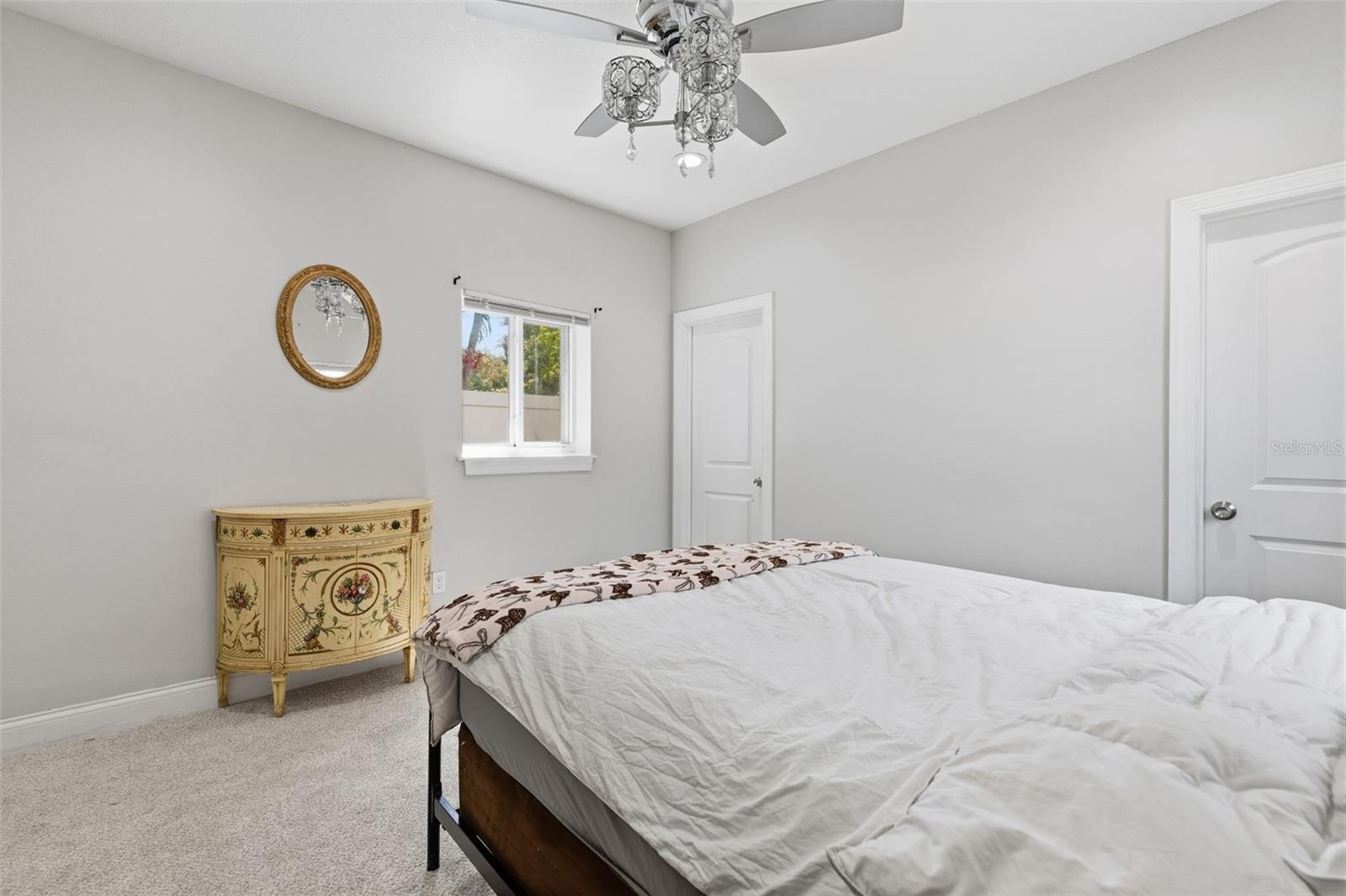 Primary bedroom with two walk-in closets