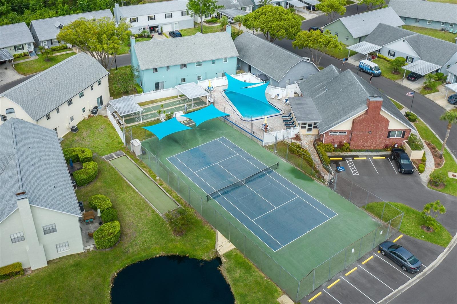 Community clubhouse, pool and tennis courts