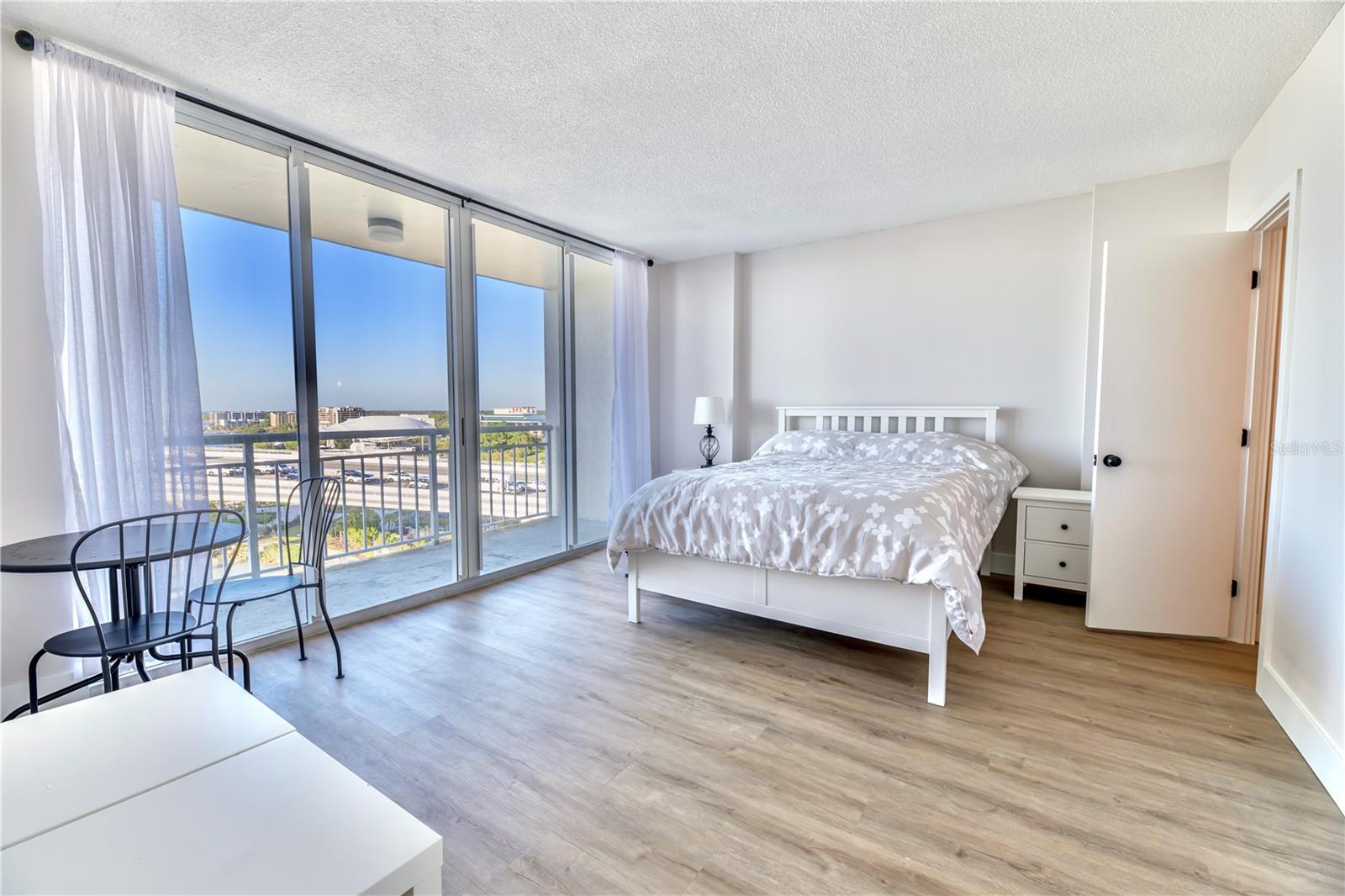 2nd bedroom with Private Balcony and Emtry into 2nd Bathroom