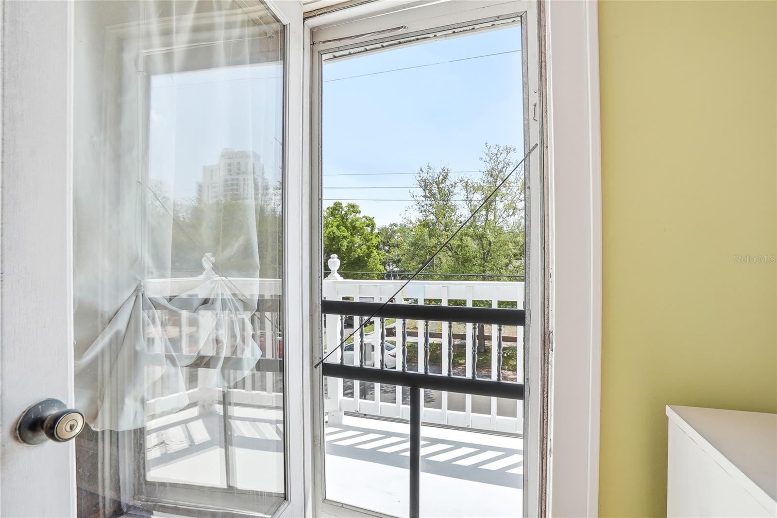 View of Upstairs Balcony from Third Bedroom, Upstairs