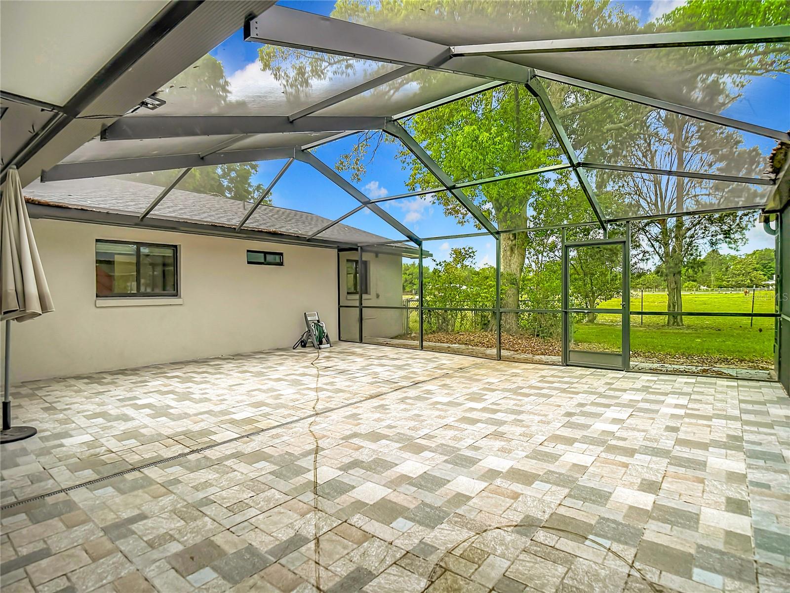 extended brick paver lanai area