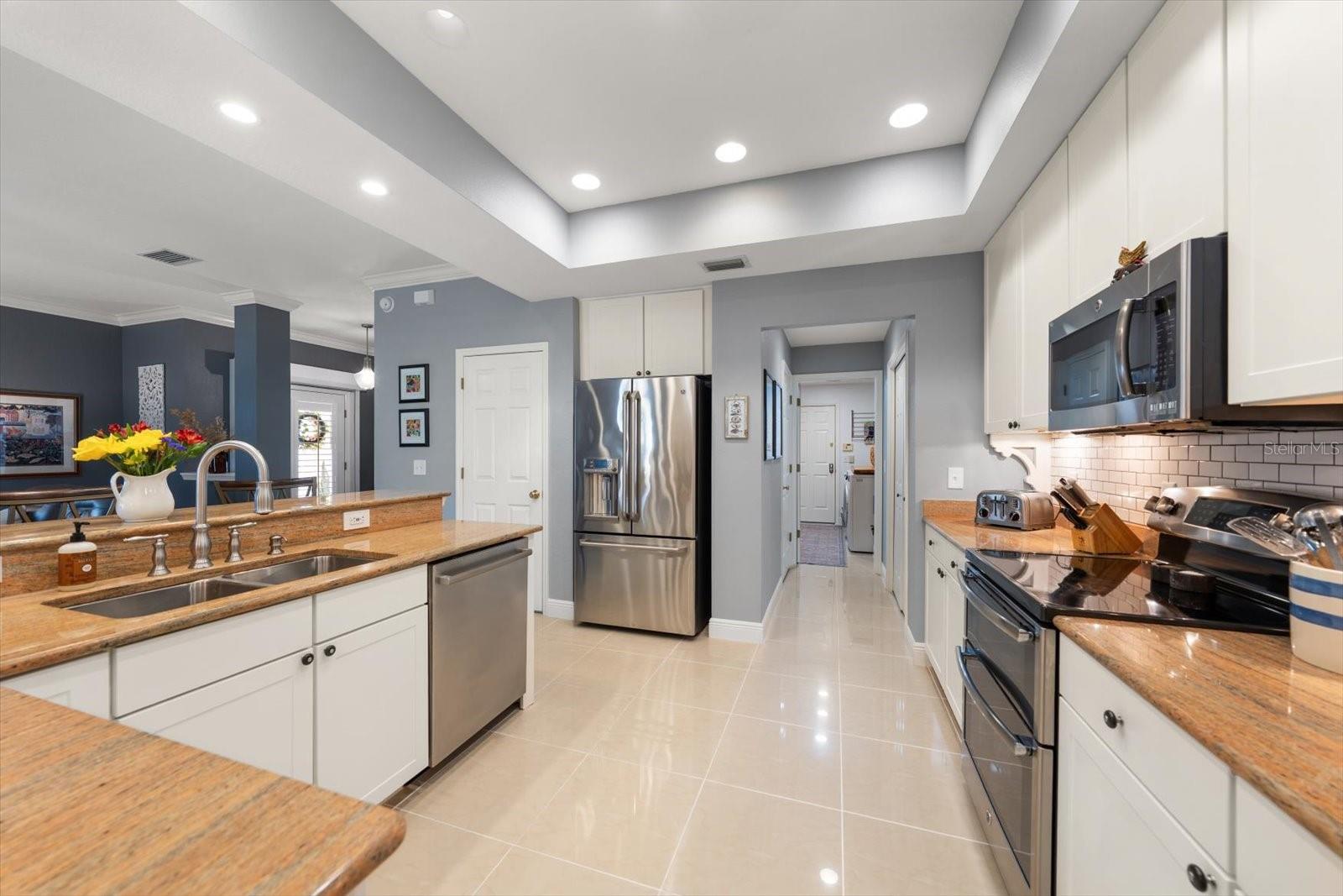 Kitchen, and hallway to laundry room and garage door
