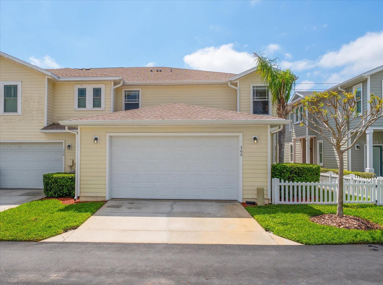 Alley access, driveway to 2 car garage, gate to backyard