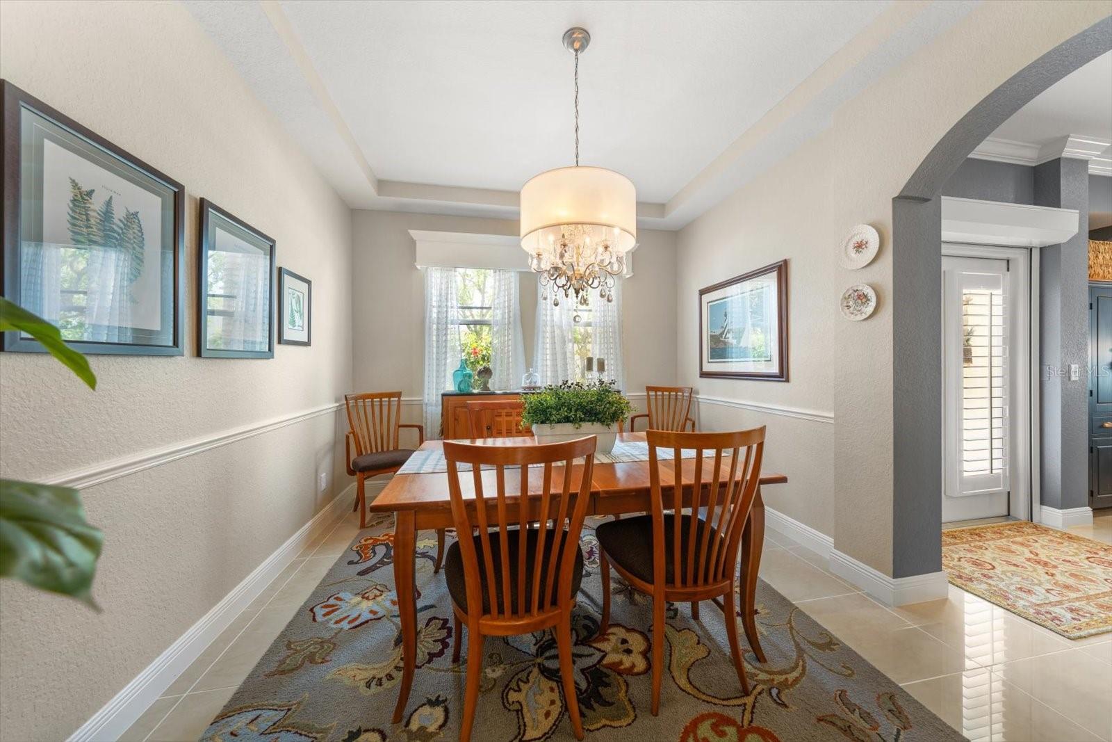 Dining room and arched entry to living room
