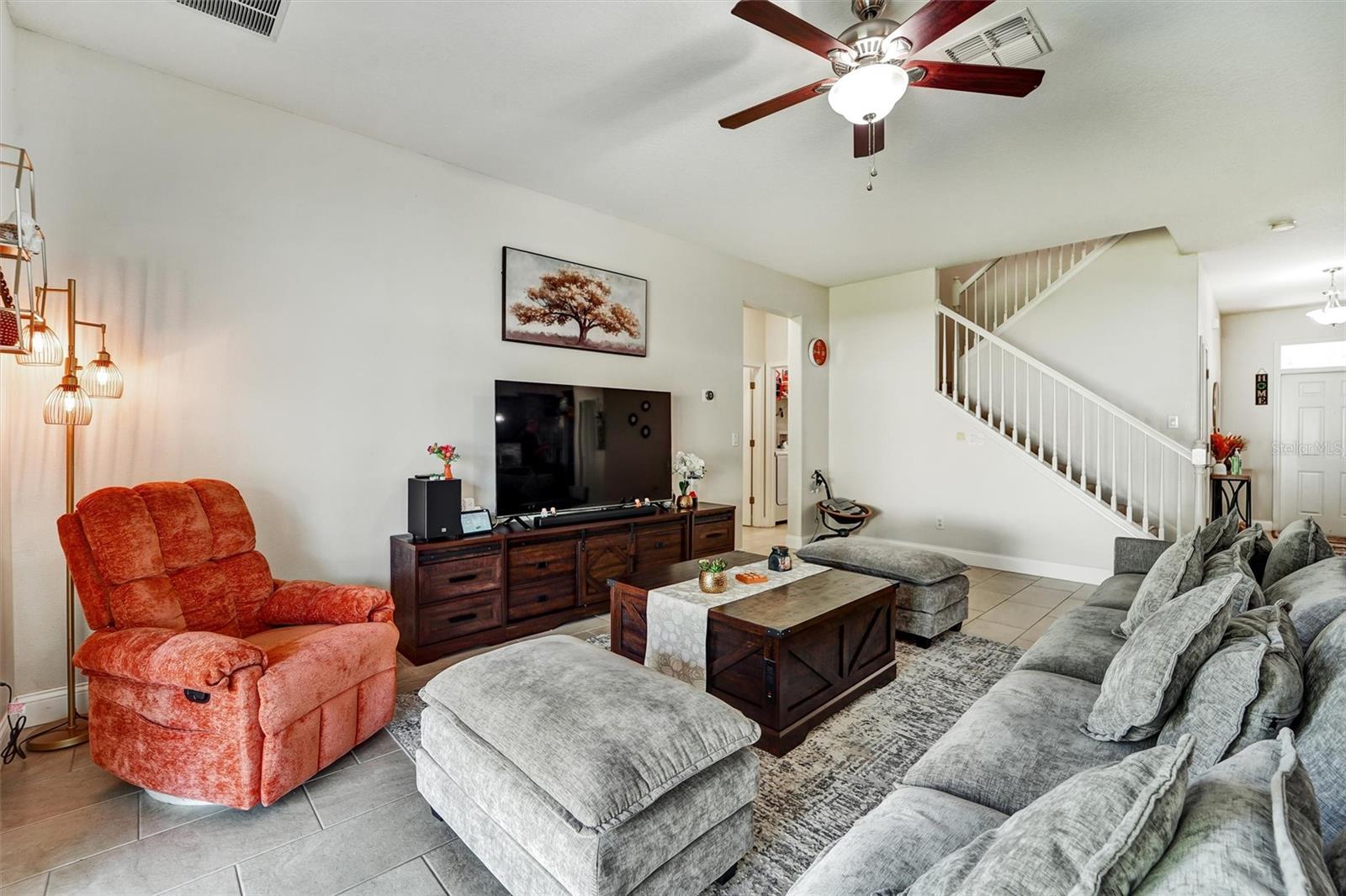 Family room with door leading to first floor bedroom and full bath