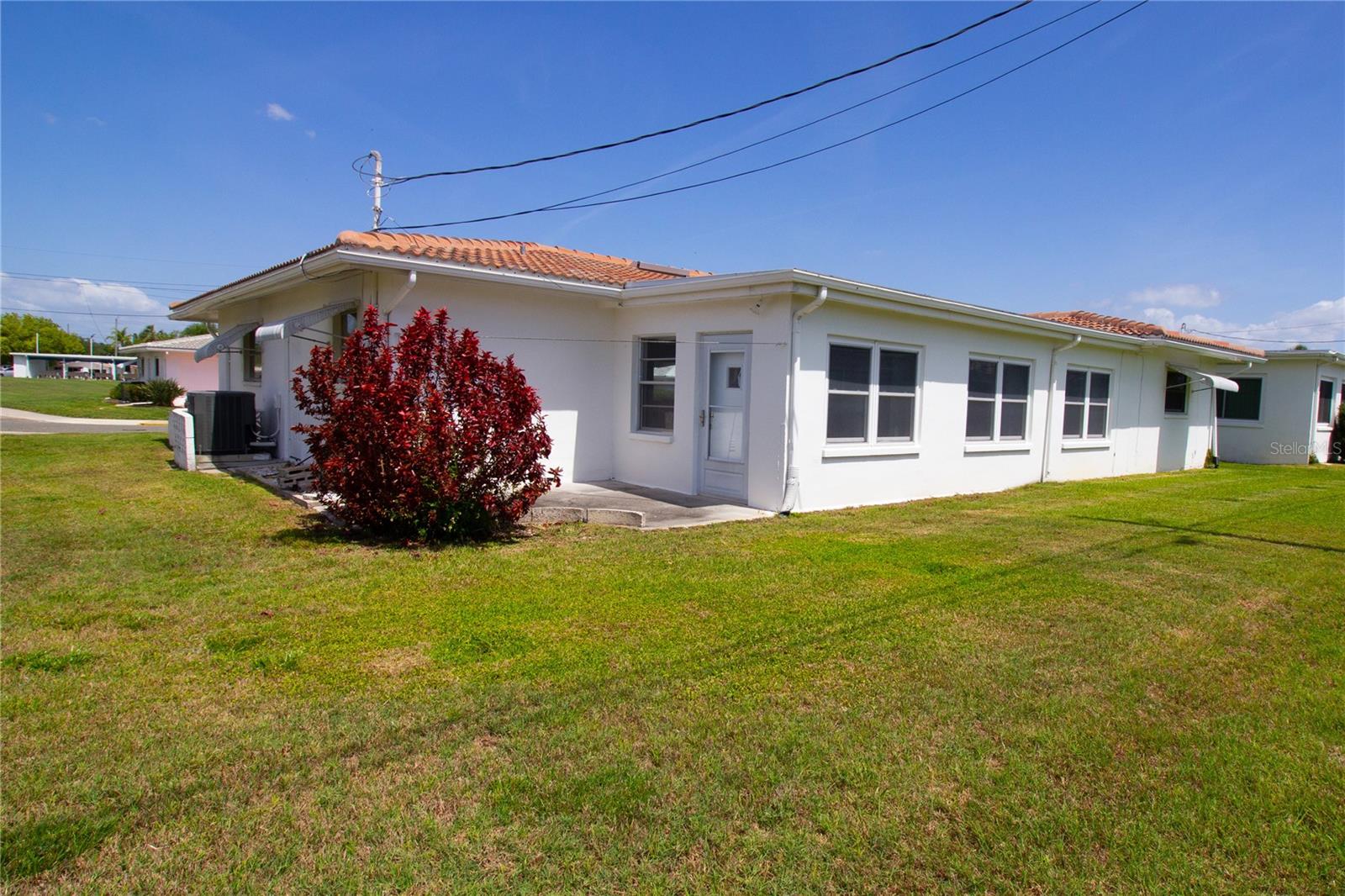 CORNER UNIT WITH LARGE BACK YARD