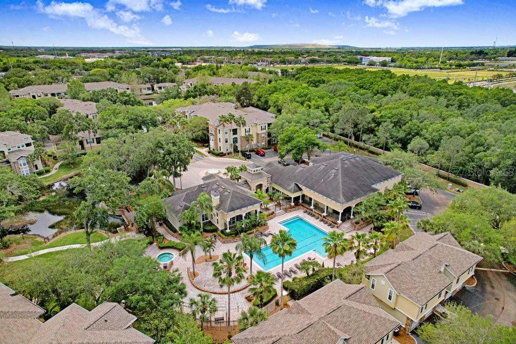 Primary Bedroom with entrance to balcony, walk in closet and ensuite bathroom