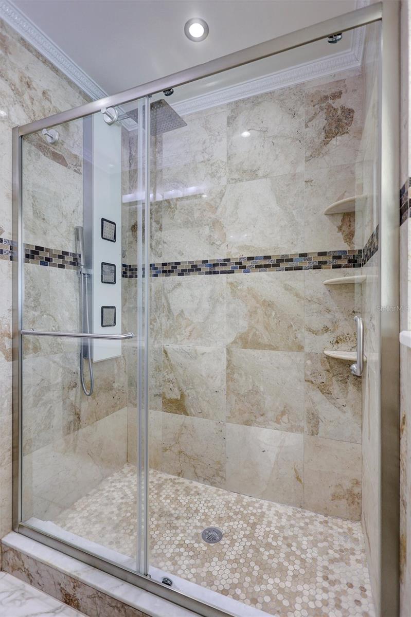 Walk In shower with travertime tile