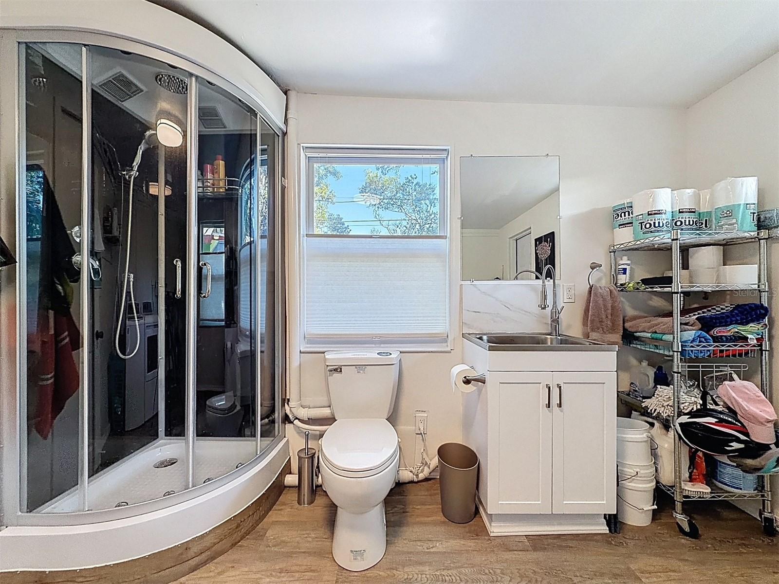 Bathroom #2 has a futuristic custom shower that you will look forward to using.