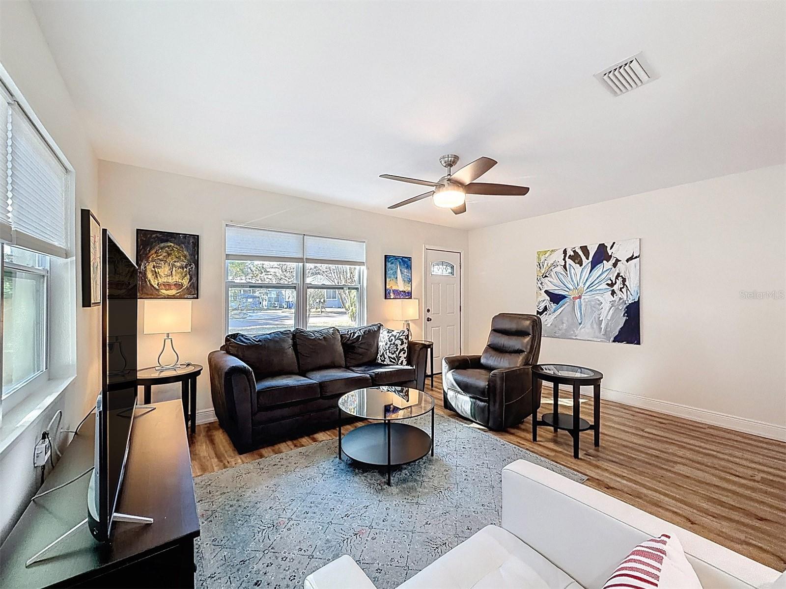 Family room is bright, warm and inviting.