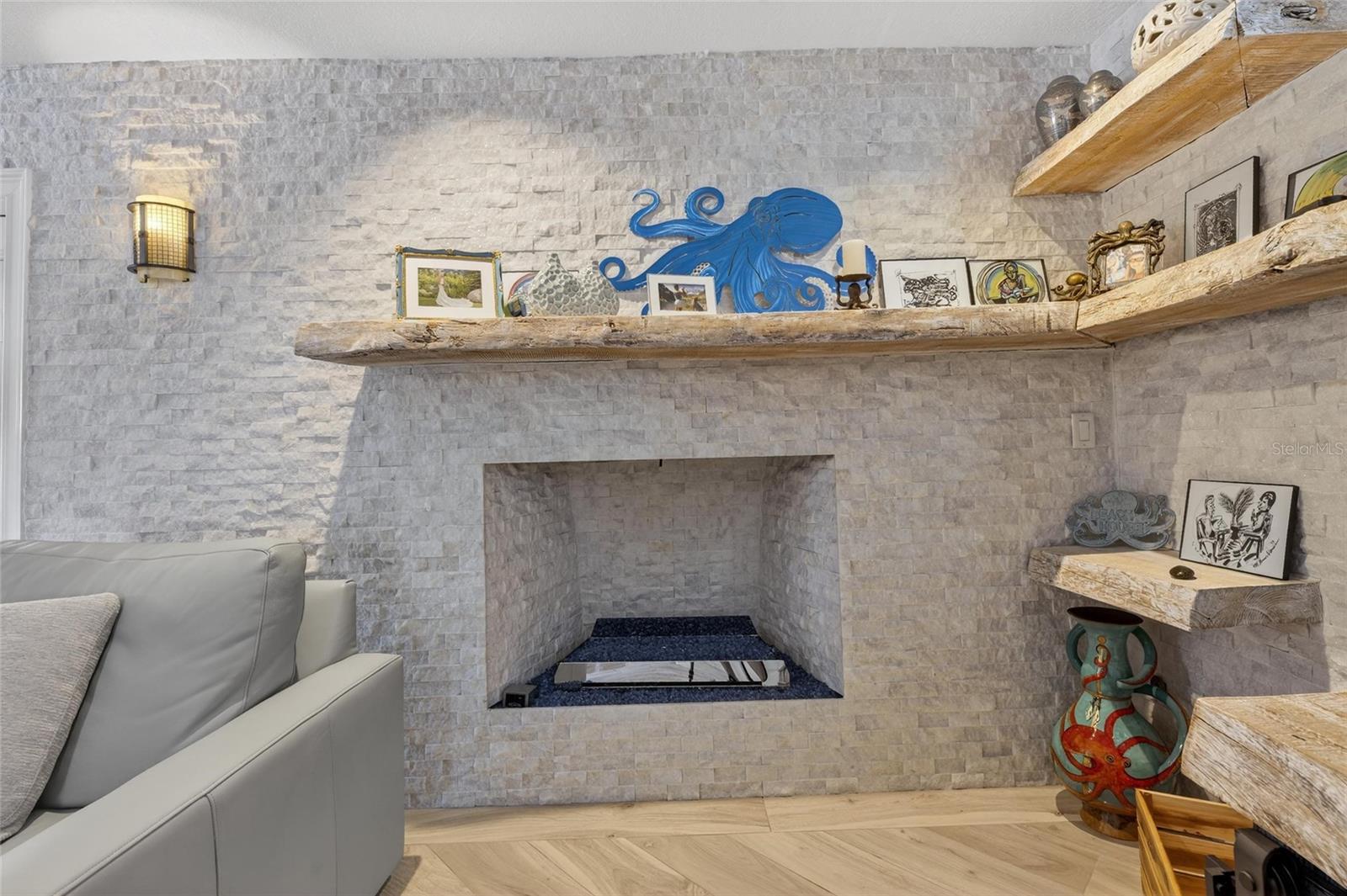 Stone gas fireplace in Living Room