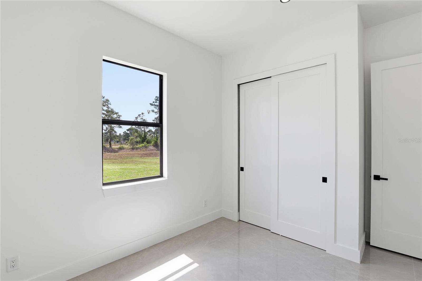 1122 S EDELWEISS ST E, LEHIGH ACRES, FL, 33974