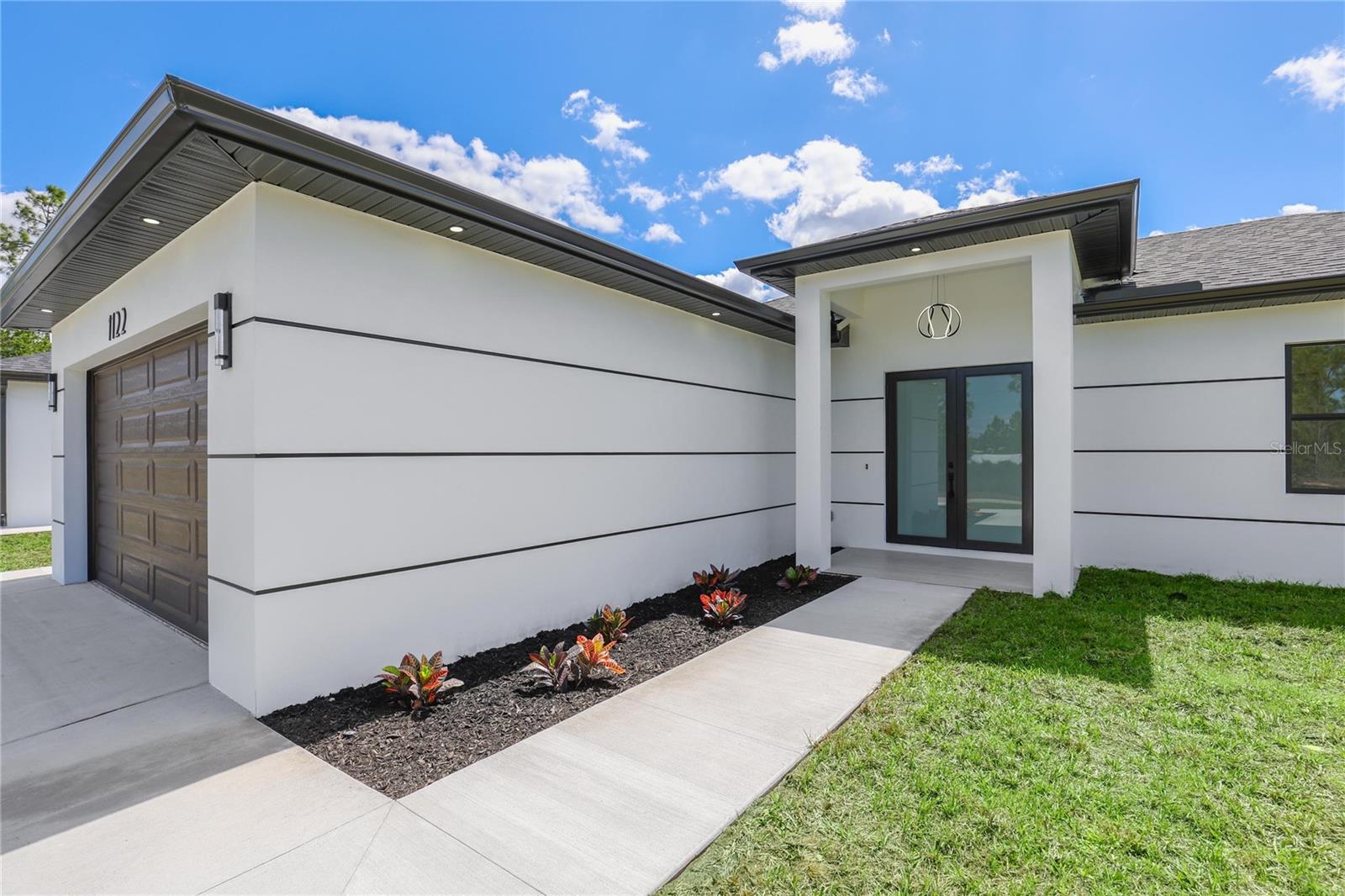 1122 S EDELWEISS ST E, LEHIGH ACRES, FL, 33974