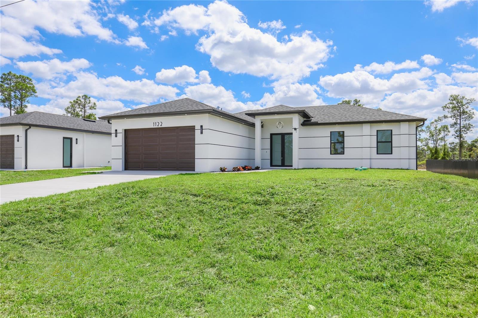 1122 S EDELWEISS ST E, LEHIGH ACRES, FL, 33974