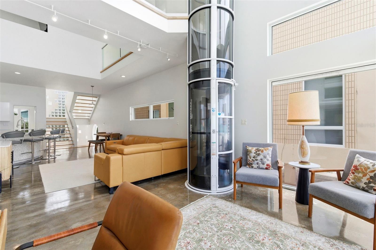 Living Room With Glass Elevator