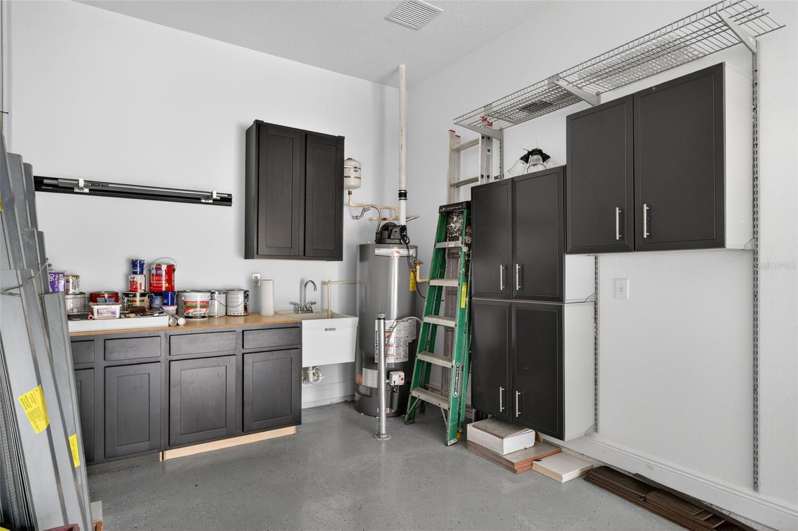 Tandem "3rd Bay" Garage with Built in Cabinets & Shelving