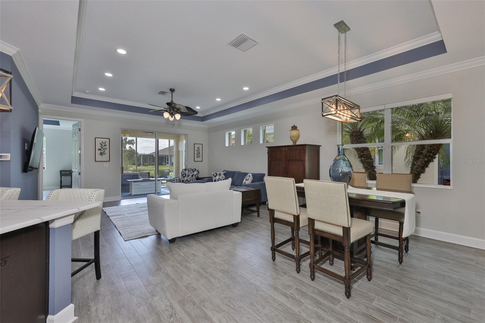 from the kitchen, you are open to the entire rest of the home. Everything is freshly painted with all new light fixtures and remote controlled variable lighting options.