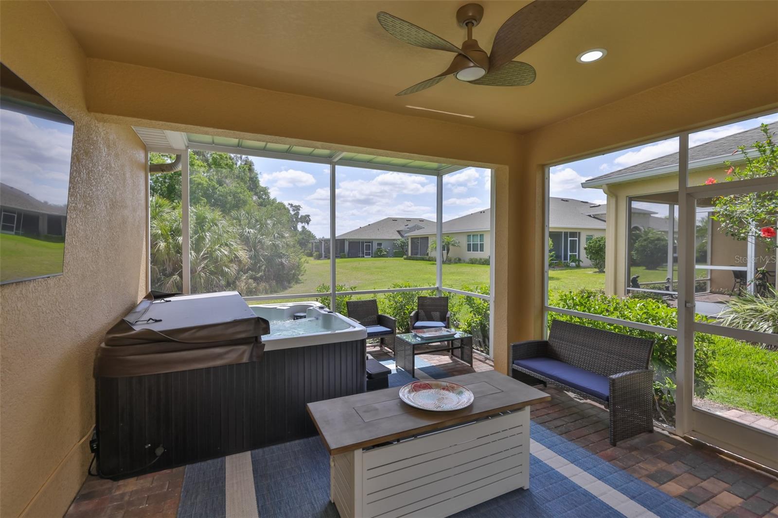 The extended patio is perfect for relaxation.  With a fire pit, jacuzzi and lounge chairs, you just need to bring your favorite drink.