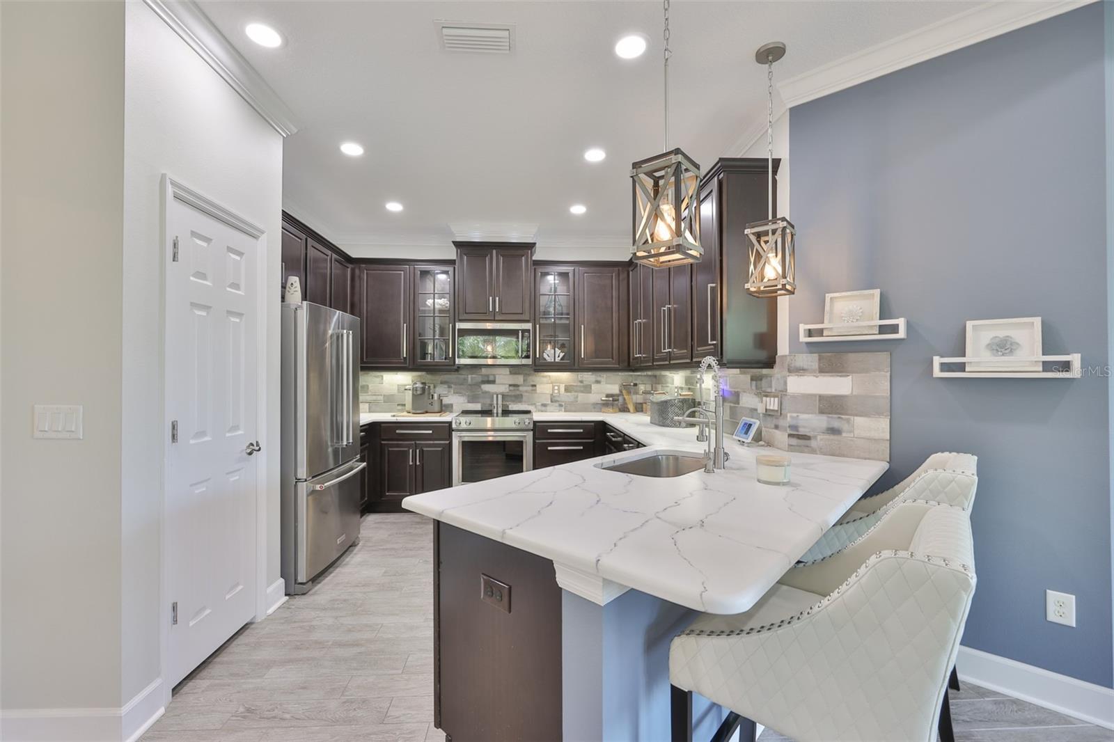 All new custom light fixtures match throughout the entire home.