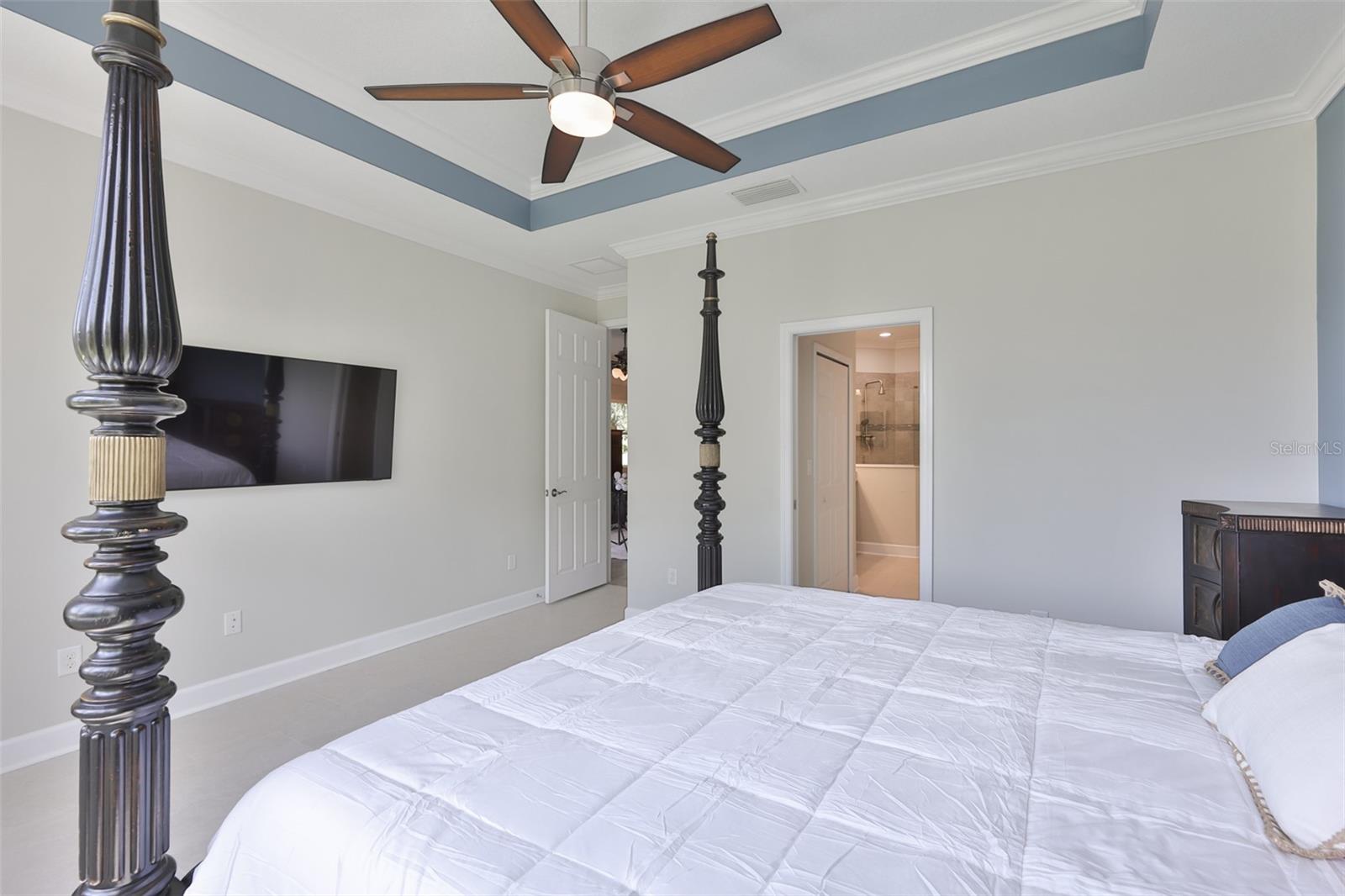 A his and hers walk in closets and ensuite bathroom, allow for maximum privacy.