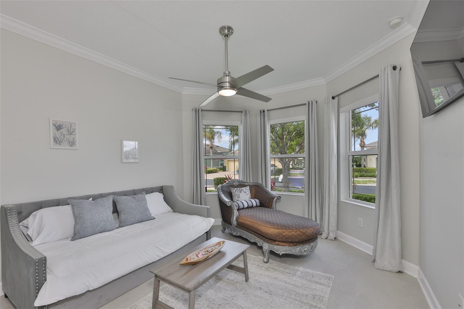 With the large, multiple bay windows, this is a perfect reading or craft room, if you don't need the third bedrom.