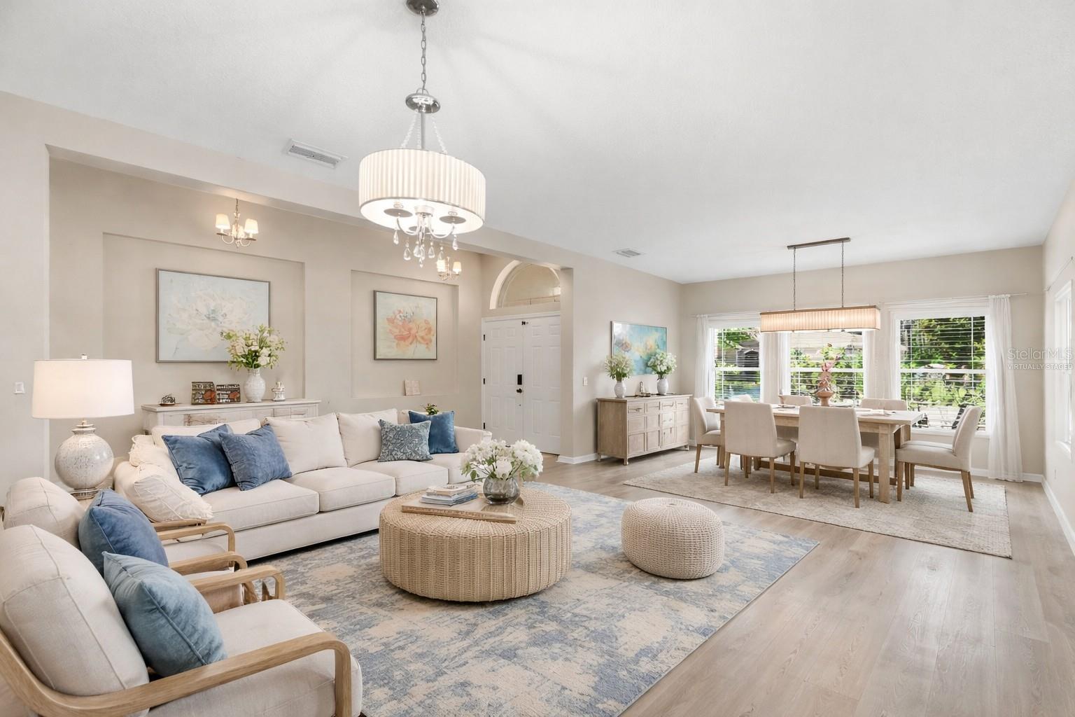 Virtually staged living & dining rooms.