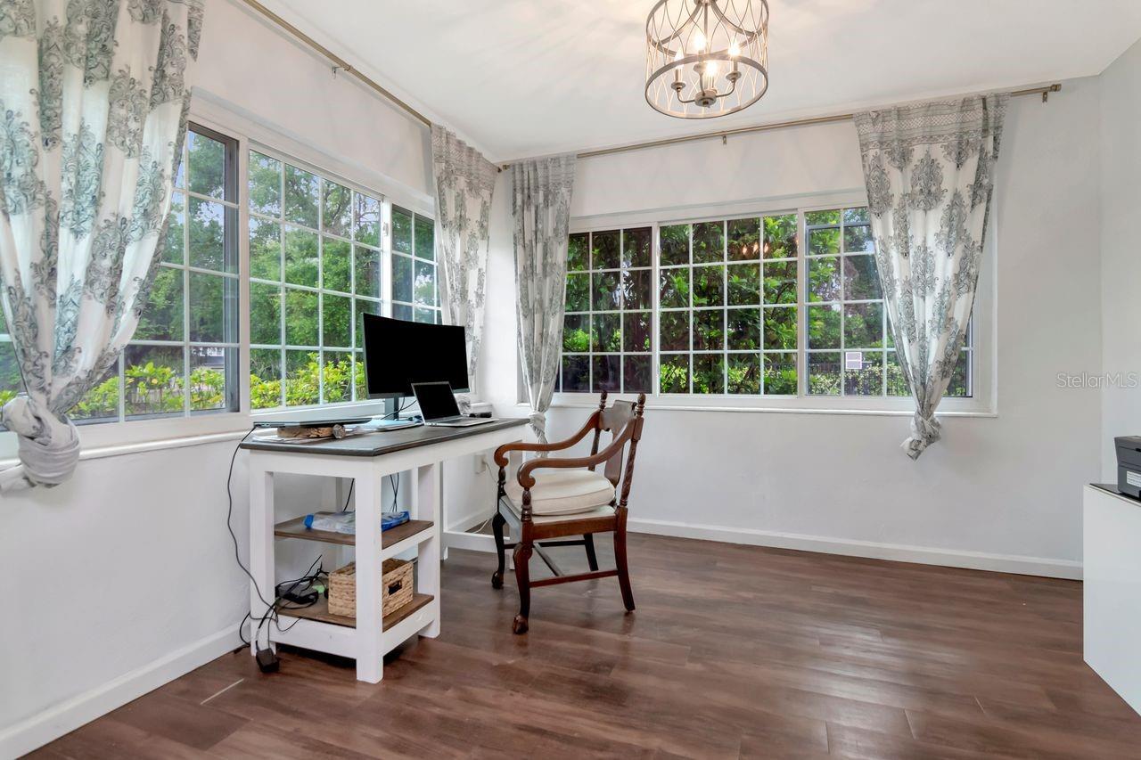 Flex Space for Office, Sunroom, Playroom and More! Tons of Windows, Natural Light and Hardwood Floors.