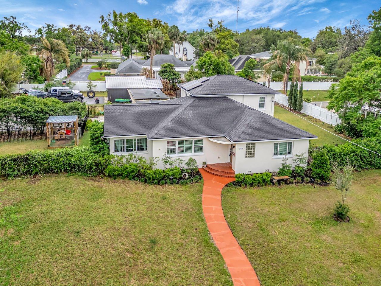 Aerial View of Home - Paid off Solar Panels - Walk to HISTORIC Downtown Dade City!