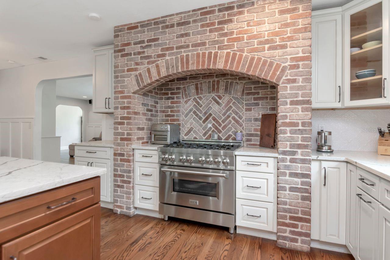 Custom Brick Alcove for the High-End upgraded Gas Stove. This makes a statement!