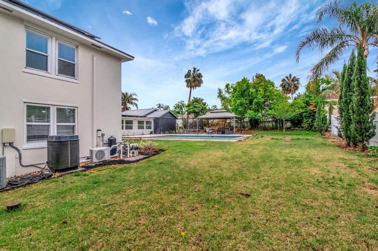 Side Yard in Backyard with Garden Bed Planter Boxes.