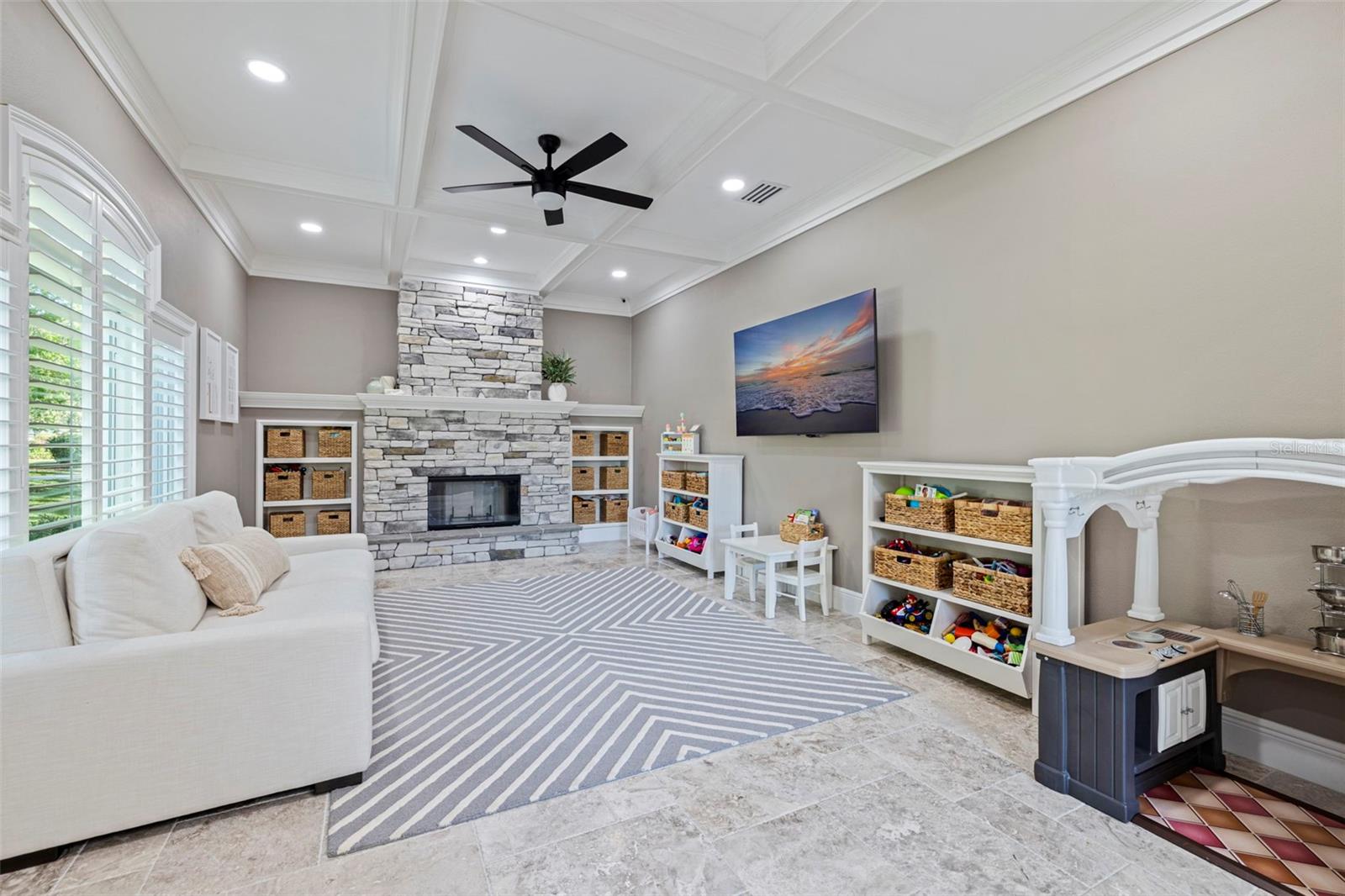 Wood-burning fireplace in additional living space.