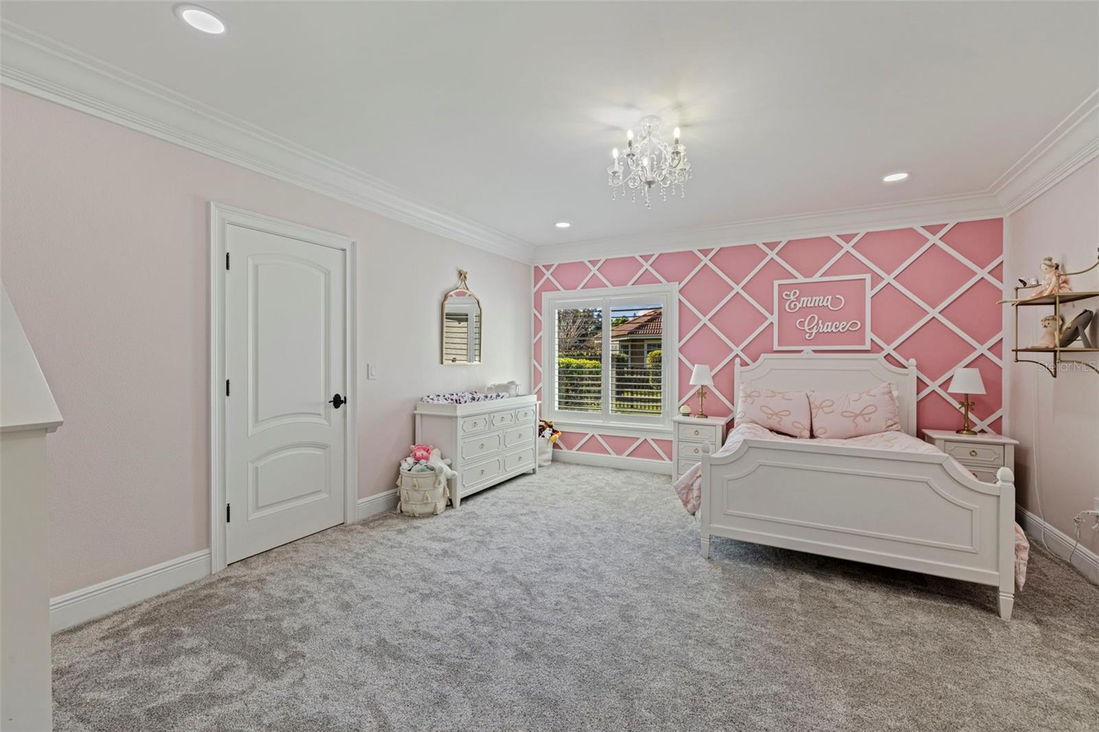 Bedroom 2 with soft natural light.