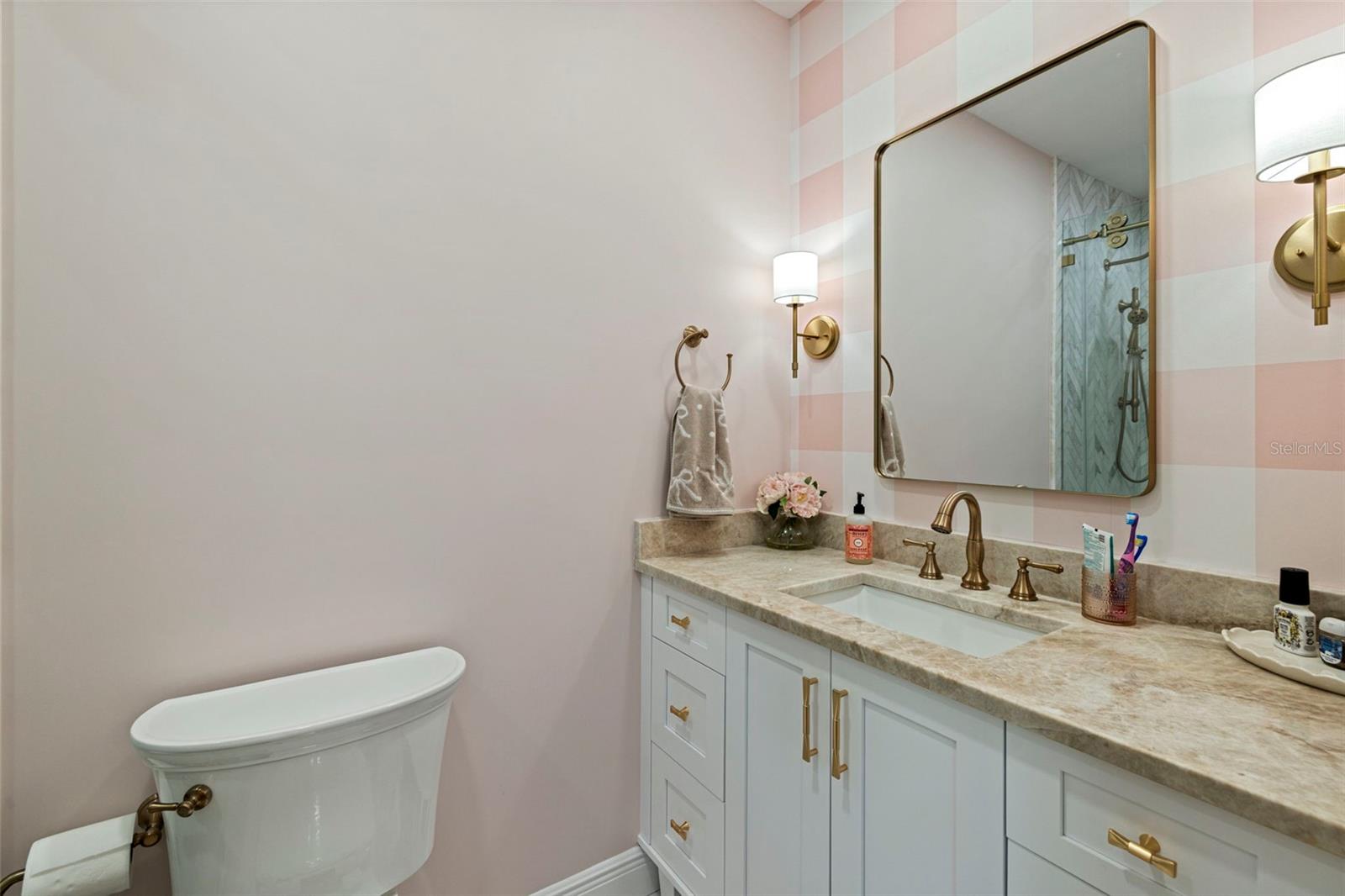 Bathroom 2 with extended vanity and ample counter space