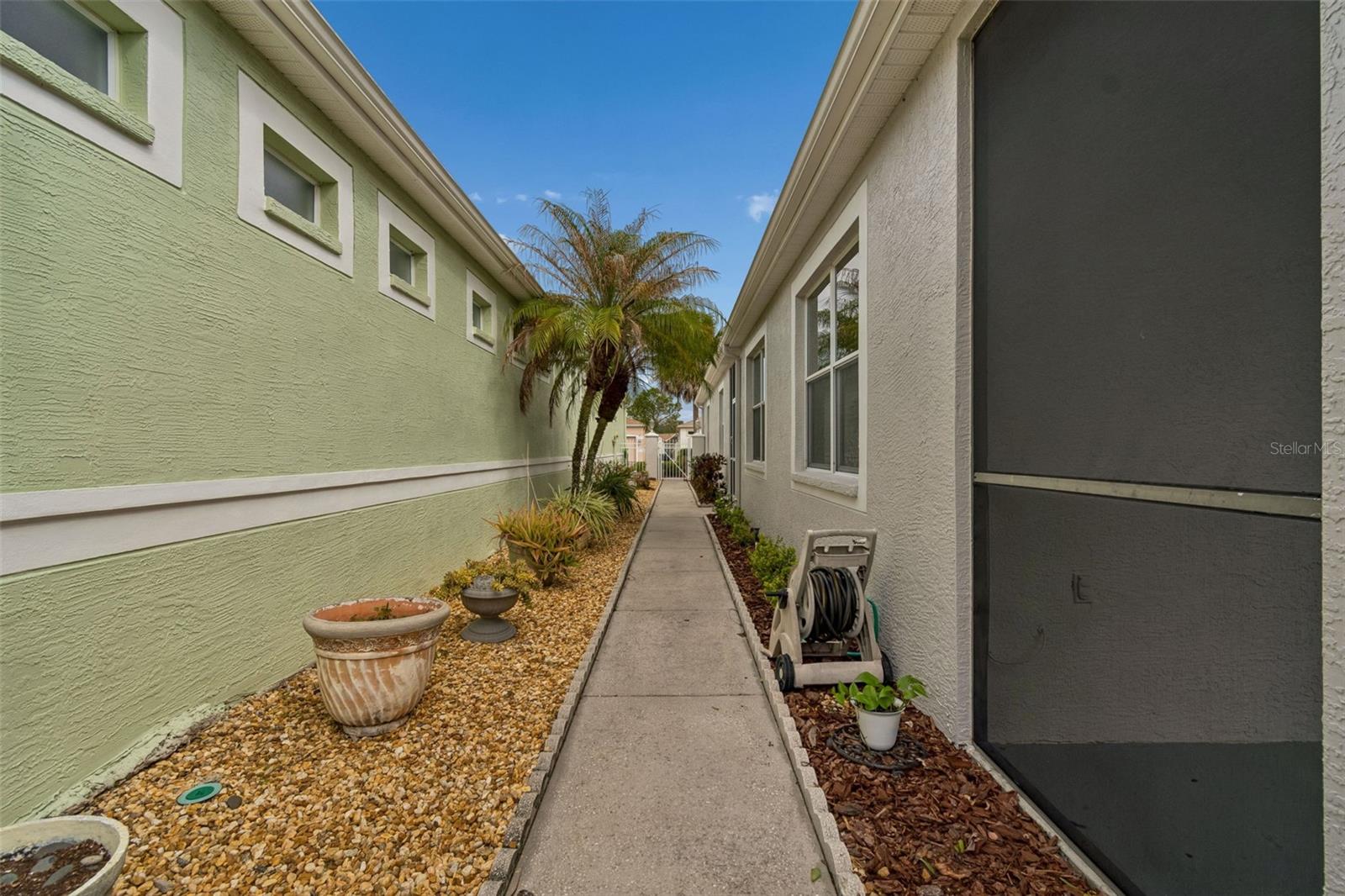 Sidewalk from Lanai to Front of Home