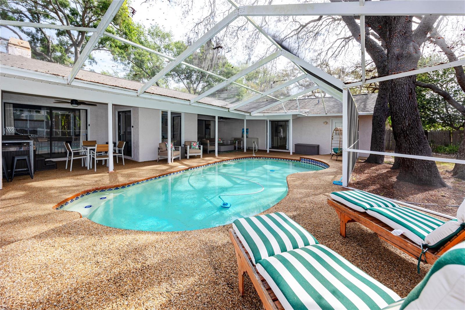 Covered pool and lanai with lots of space to entertain.