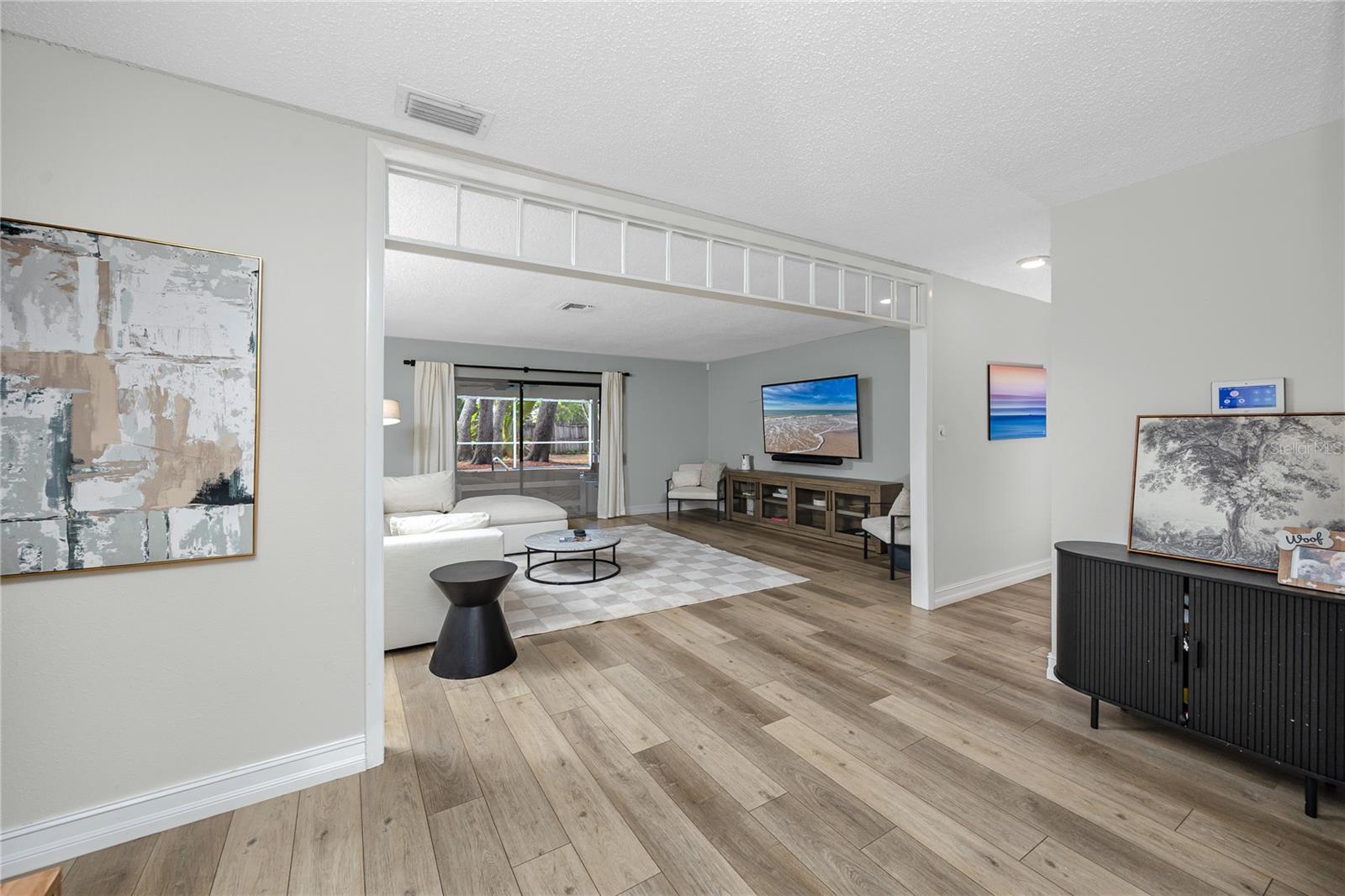 Large foyer with view out to the pool
