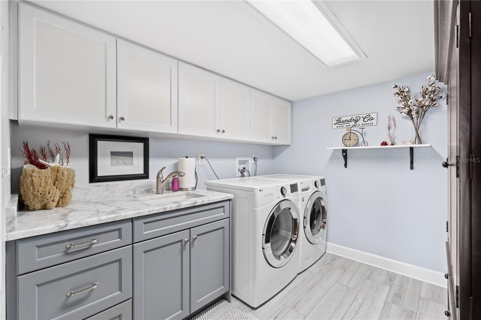 oversized laundry room inside unit