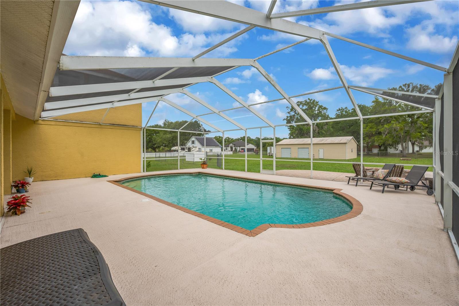 View of the backyard from the pool
