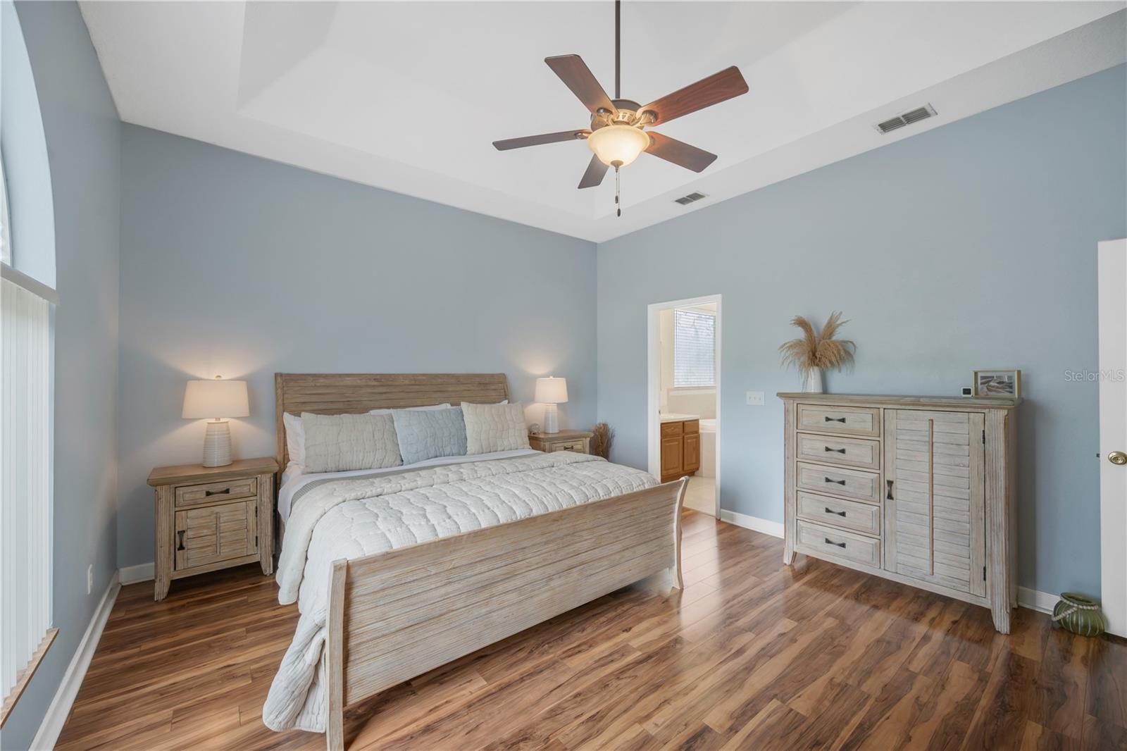 Another view of primary bedroom