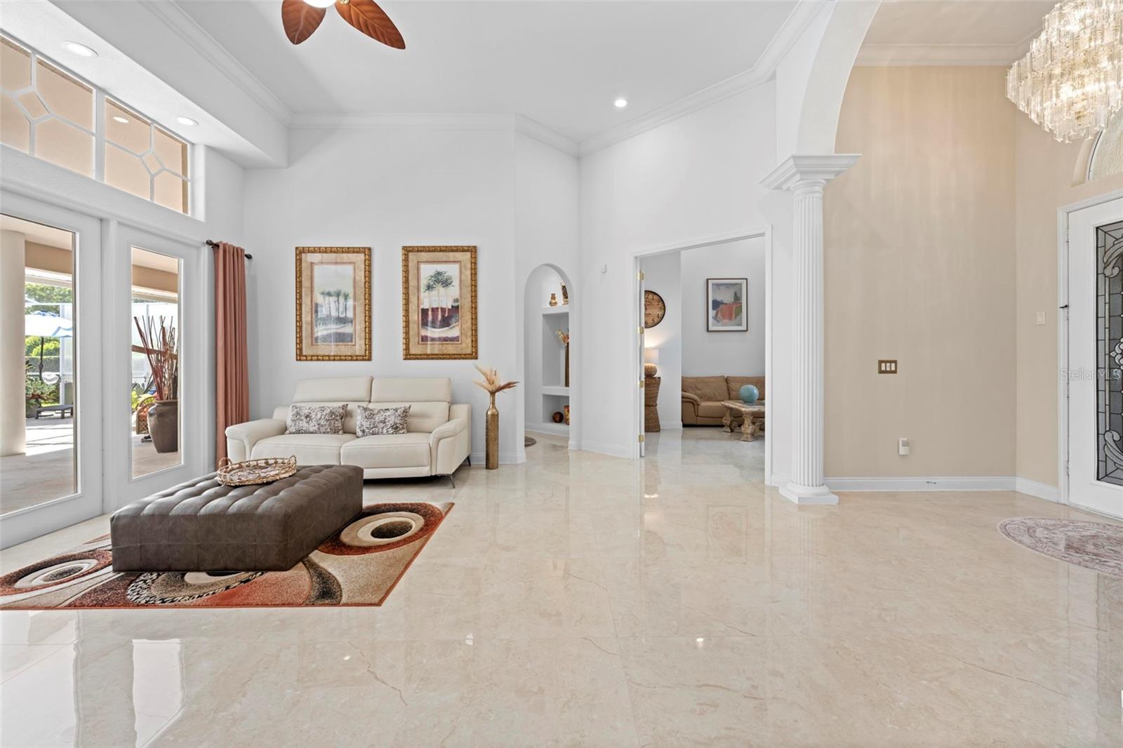View 2 of Living Room and Foyer - French Doors to the Pool