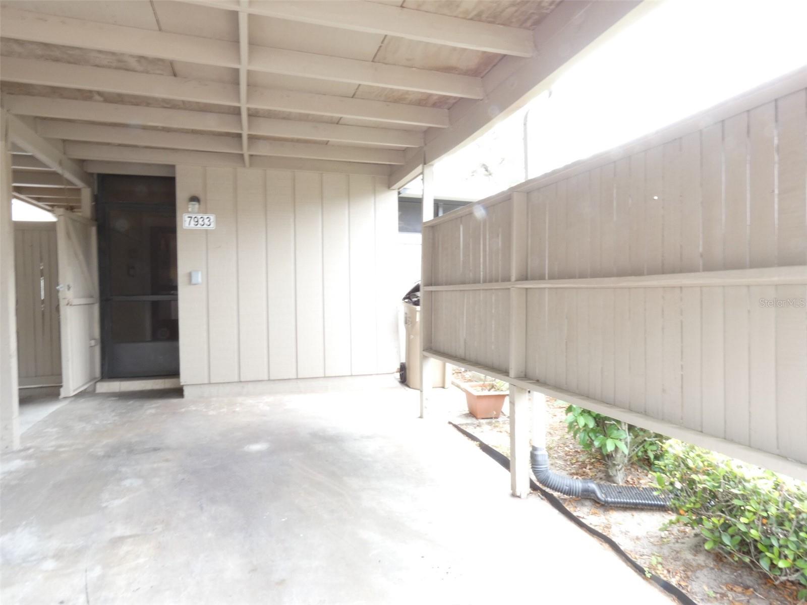 rear entry from carport