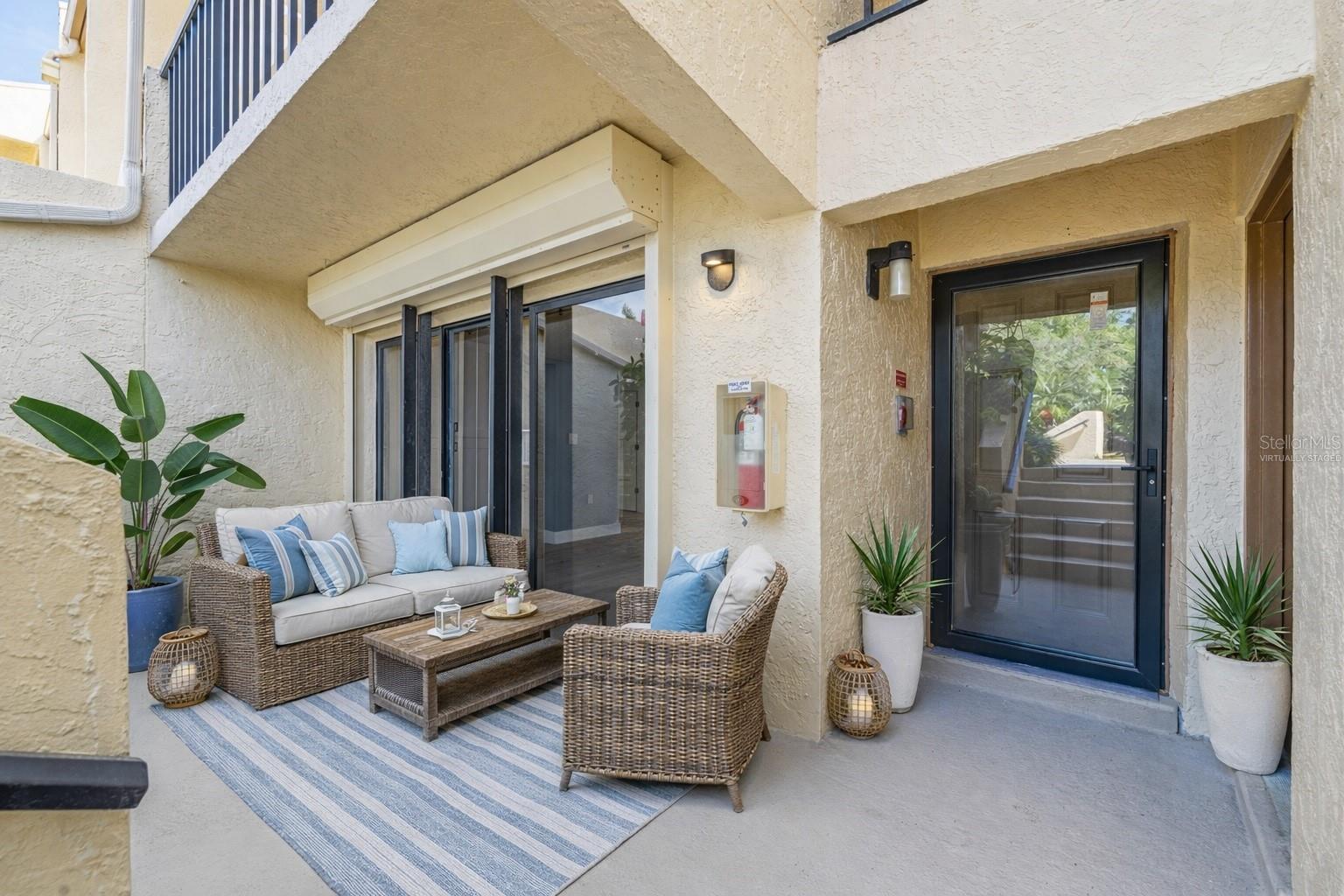 Virtually staged entrance and front patio